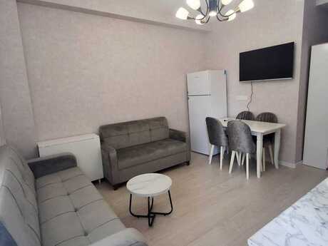 2-room new-build apartment for rent in 20 Yanvar, 60 m², 600 AZN/mo, photo 2 / 4