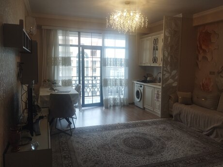 28 Mayda 2 otaqlı yeni tikili mənzil satılır, 70 m², 250 000 AZN, şəkil 2 / 12