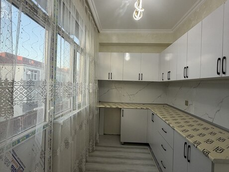 Qurtuluş 93 kompleksində 2 otaqlı yeni tikili mənzil satılır, 57 m², 76 000 AZN, şəkil 3 / 9