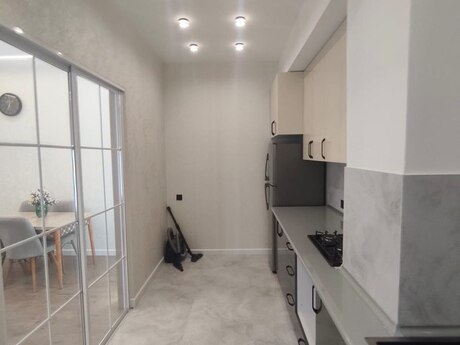 28 Mayda 2 otaqlı yeni tikili mənzil kirayə verilir, 60 m², 1 200 AZN/ay, şəkil 4 / 10
