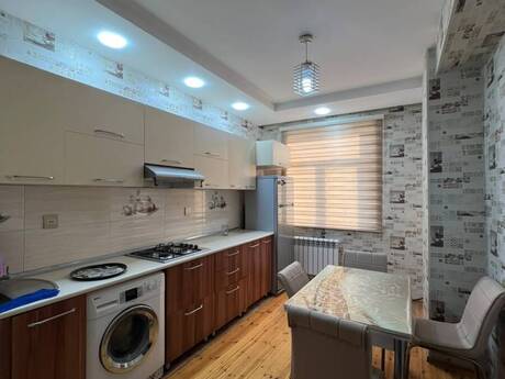 Qurtuluş 93 kompleksində 2 otaqlı yeni tikili mənzil satılır, 75 m², 105 000 AZN, şəkil 3 / 11