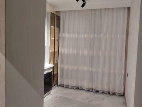 Bakıxanovda 2 otaqlı yeni tikili mənzil kirayə verilir, 74 m², 770 AZN/ay, şəkil 2 / 12