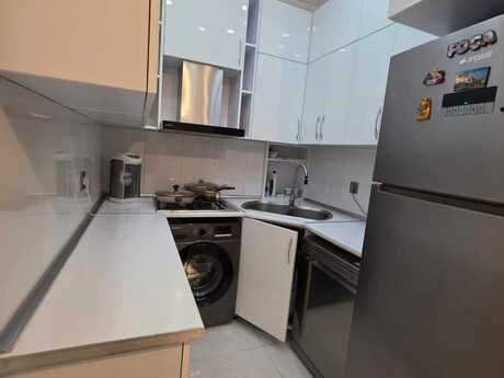 3-room new-build apartment for sale in Bakıxanov, 55 m², 186 000 AZN, photo 4 / 12