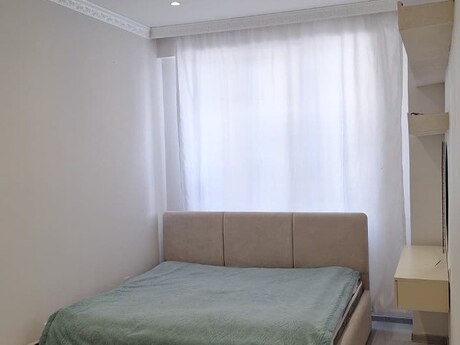2-room new-build apartment for sale in Bakıxanov, 54 m², 125 000 AZN, photo 5 / 9