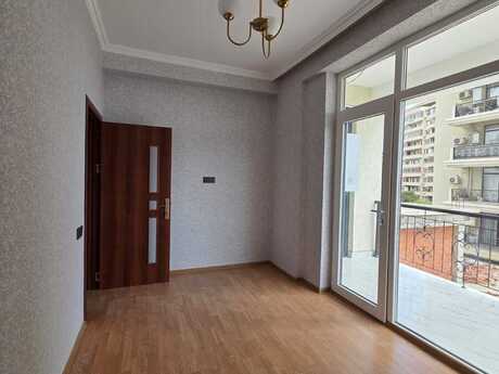 28 Mayda 2 otaqlı yeni tikili mənzil satılır, 74 m², 250 000 AZN, şəkil 2 / 11