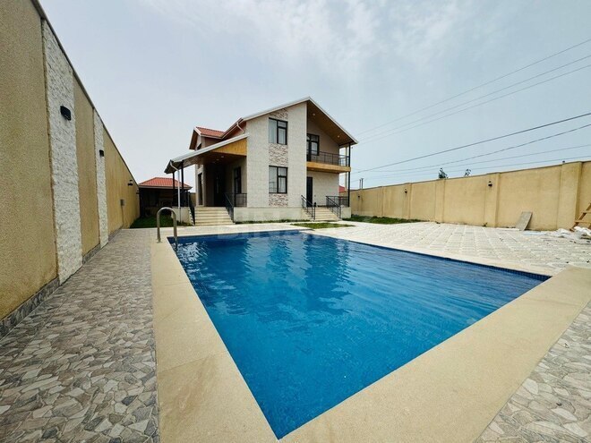 6 otaqlı həyət evi/bağ evi - Novxanı q. - 280 m² (1)