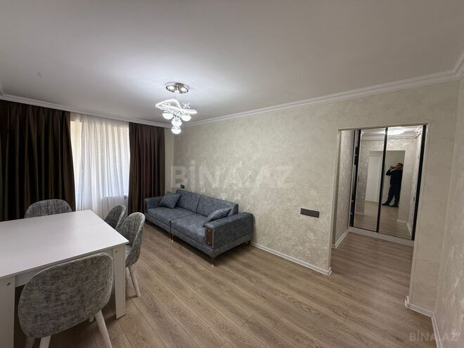 Продаётся 2-комн. вторичка 57 м², м. Кара Караев, photo 1 from 14