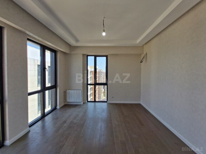 Продаётся 2-комн. новостройка 57 м², м. Элмляр Академиясы, photo 3 from 16