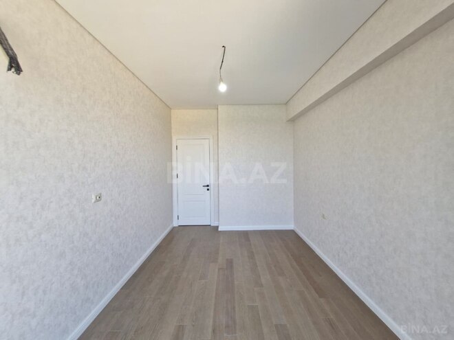 Продаётся 2-комн. новостройка 57 м², м. Элмляр Академиясы, photo 6 from 16