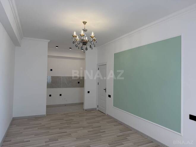Продаётся 2-комн. новостройка 57 м², м. Элмляр Академиясы, photo 11 from 16