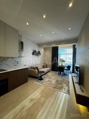 Продается 2-комн. новостройка 56 м², м. Элмляр Академиясы, photo 1 from 7
