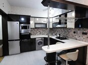 2 otaqlı yeni tikili - 7-ci mikrorayon q. - 66.5 m²